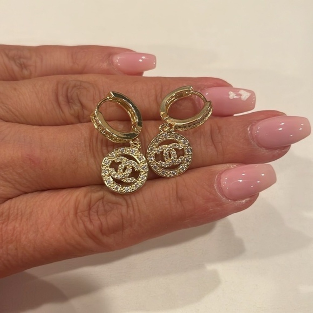 New Gold plated pair of designer look dangling Huggies Earrings